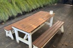 Outdoor table with benches
