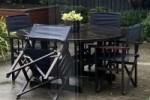 Yamaha upright piano and outdoor table set with four chairs