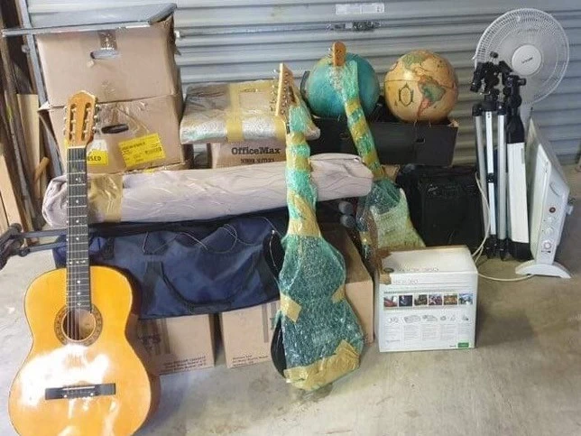 Assorted boxes and guitars