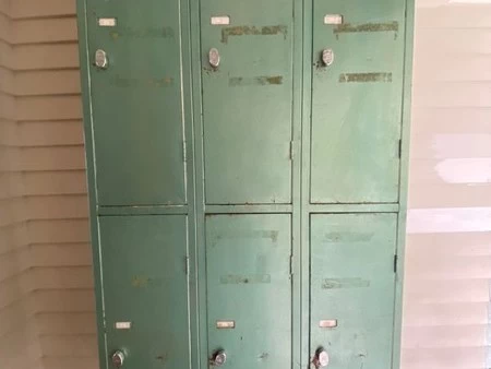 Retro industrial steel locker in metallic green