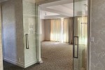 Pair of frameless glass interior doors on pivots (2)