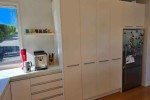Fridge/freezer, Oven, Cooktop, Dishwasher drawers, Stone benchtop incl...