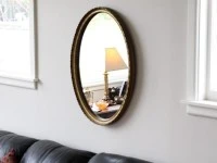 Oval gilt style vintage mirror