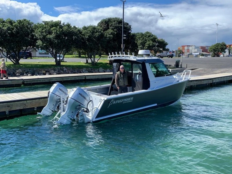 Small boat 6.7 Aluminium Catamaran on a trailer towable