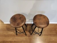 Pair of Industrial style tan and black bar stools
