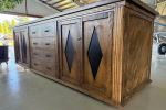 Large wooden cabinet on wheels
