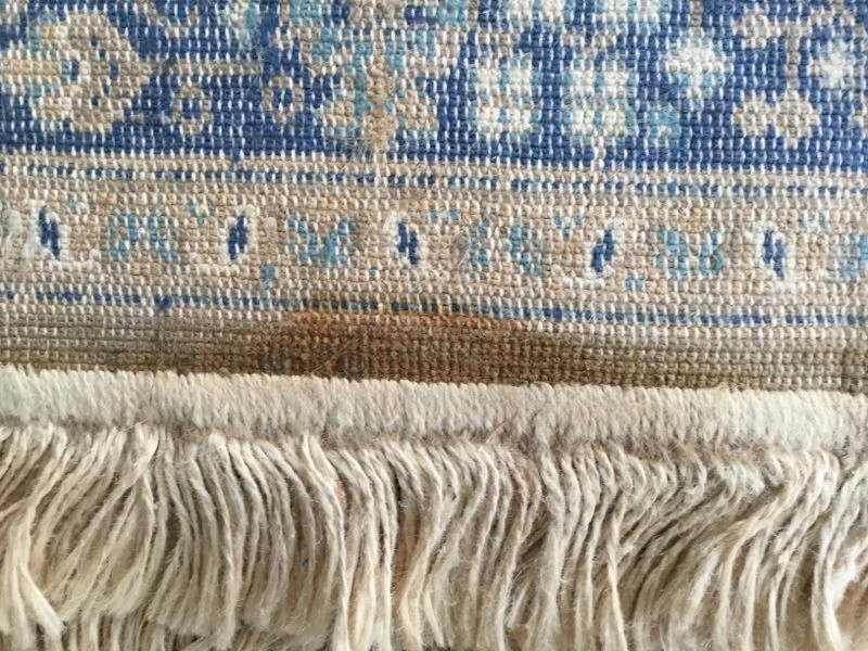 Hand knotted Blue and cinnamon rug very luxe feel