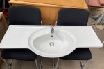 Two lounge chairs and a vanity sink top under half a cubic metre in to...