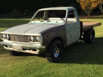 2x Toyota Hilux utes 1975 and 1x 1965 Rambler Classic.