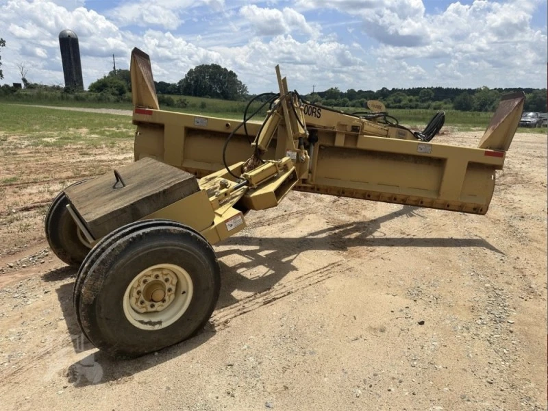 Tractor grader blade tow behind