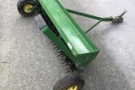 Tow behind lawn aerator