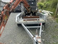 Hitachi Zaxis 17u and tandem trailer