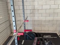 Packed Squat rack, Barbell, Gym mats and weights