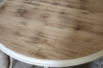 Solid timber round extendable table and four chairs
