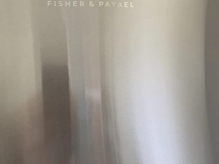 Fisher & Paykel fridge freezer nearly new