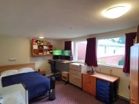 Queen bed with mattress, Dresser, Desk, 30 clothes coats, jackets, pan...