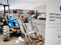 New Holland TL100 tractor with front end loader fire damaged