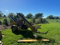Trailer with ag machinery on it