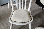 Solid timber round extendable table and four chairs