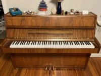 Wooden upright Kawai piano