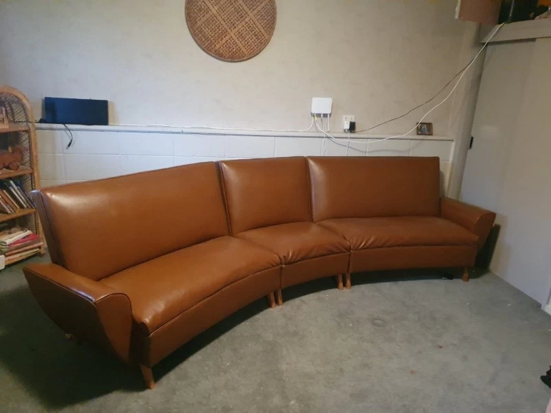 Modular curved sofa - in three pieces. Somewhat heavy, but I don't kno...