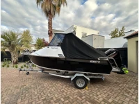 Assualt 575 ali boat on single axle trailer