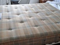 Queen mattress with broken down frame