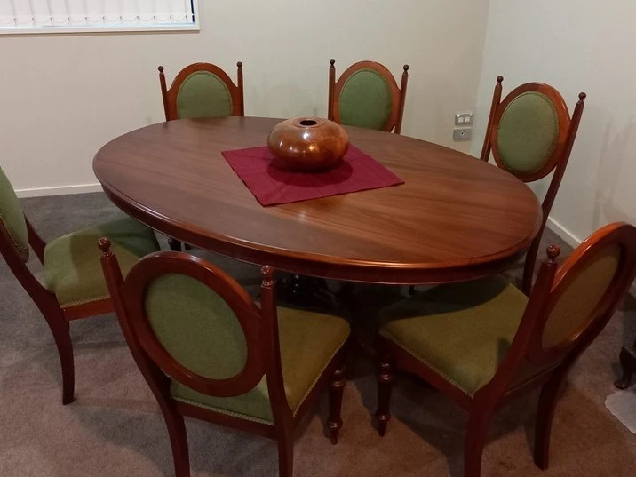 Oval NZ Kauri dining table and six chairs