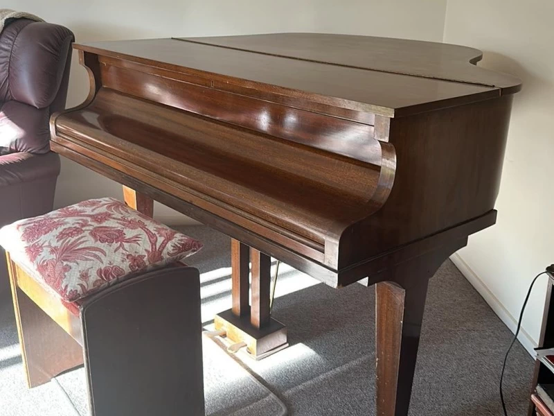 Baby grand piano, unknown brand, not a high-end instrument