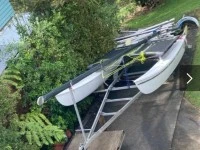 Small boat Hobie 16 on trailer