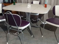 Fold down table and stackable dining chairs