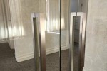 Pair of frameless glass interior doors on pivots (2)