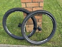 2 Unboxed but strapped togetherMountain Bike Wheels and Tyres.