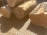 4 logs 1.5 m long and .5 m in diameter