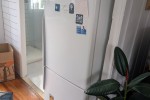 Queen bed mattress + frame, Sit/stand desk, 2 seater couch, Fridge