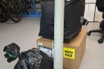 Two boxes, one medium. One small, poster roll and a packed duvet