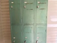 Retro industrial steel locker in metallic green