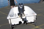 Small boat dinghy on trailer