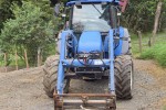 Cab tractor and front end loader with implement on back 5.4mts