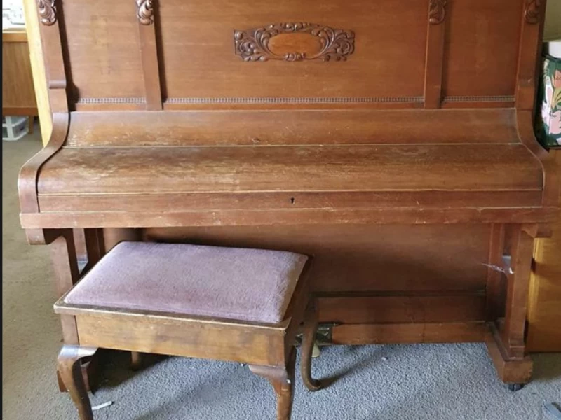 Antique upright piano appears an upright grand.  Brand is not visible ...