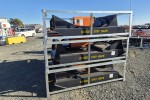 Steel crate with mower inside