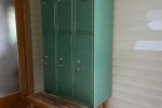 Retro industrial steel locker in metallic green