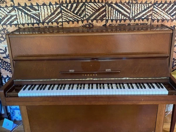 Upright - move within Auckland piano