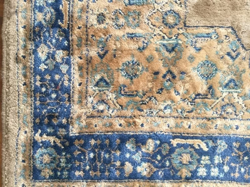 Hand knotted Blue and cinnamon rug very luxe feel