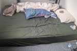 2 queen size beds, A wooden table, Drawer (2), Drawer, Fridge, Washing...