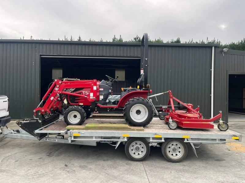 Sub compact tractor with mower