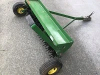 Tow behind lawn aerator