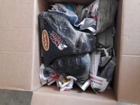 Box of motorbike plastics and one rear suspension