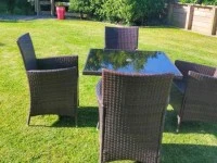 Rattan outdoor table and 4 chairs brown