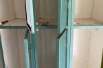 Retro industrial steel locker in metallic green